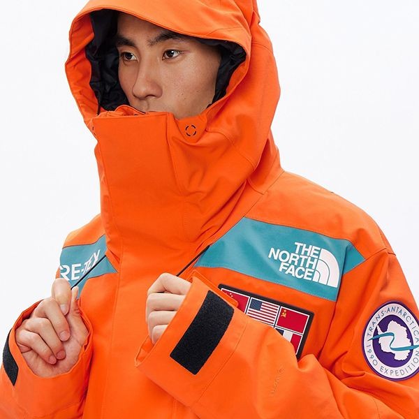 TNF トランスアンタークティカパーカレッドオレンジ TNF トランスアンタークティカパーカレッドオレンジ